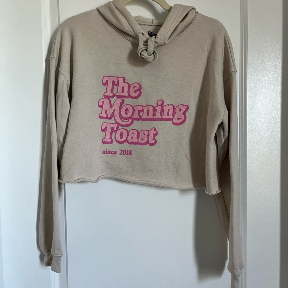 Throwback The Morning Toast/ The Toast Beige Cropped Hoodie with Pink Text
